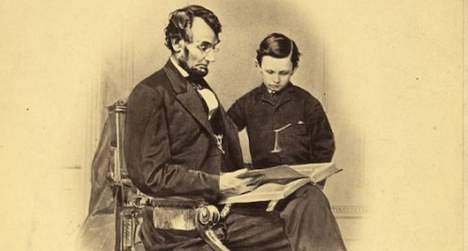 abraham lincoln reading a book
